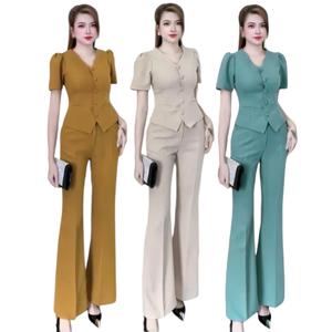 Sét bộ đồ vét áo tay con kèm quần ống loe nhẹ nắp túi giả nút bọc vải mang tôm dáng sang trọng