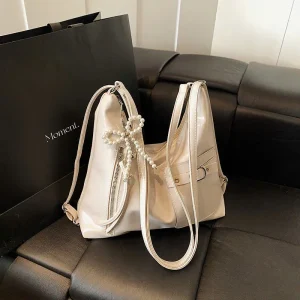 Túi Xách Nữ Đeo Chéo Kiêm Ba Lô Da Bóng Phối Ngọc – Cá Tính & Sành Điệu 2025 CUN288